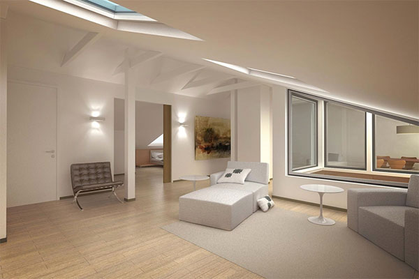 Valoisa ja moderni olohuone, jossa on kattoikkunat, vaaleat huonekalut ja puulattia. Seinällä taideteos ja istuimia.